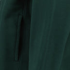 Image de l'article Pull à col zippé en molleton de coton vert de la marque Dior pour Homme - Saison Printemps-Été 2026 - Vue détaillée_2