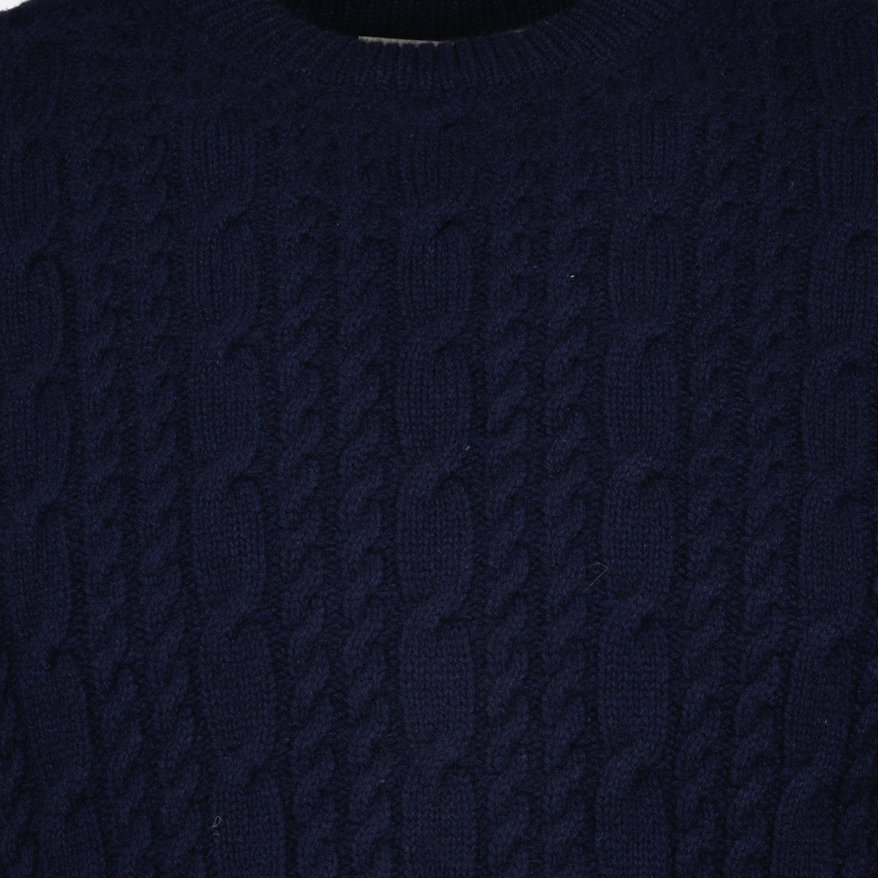 Image of the navy blue knitted sweater from the brand Dior for Men - Spring-Summer 2026 - Detailed View 2