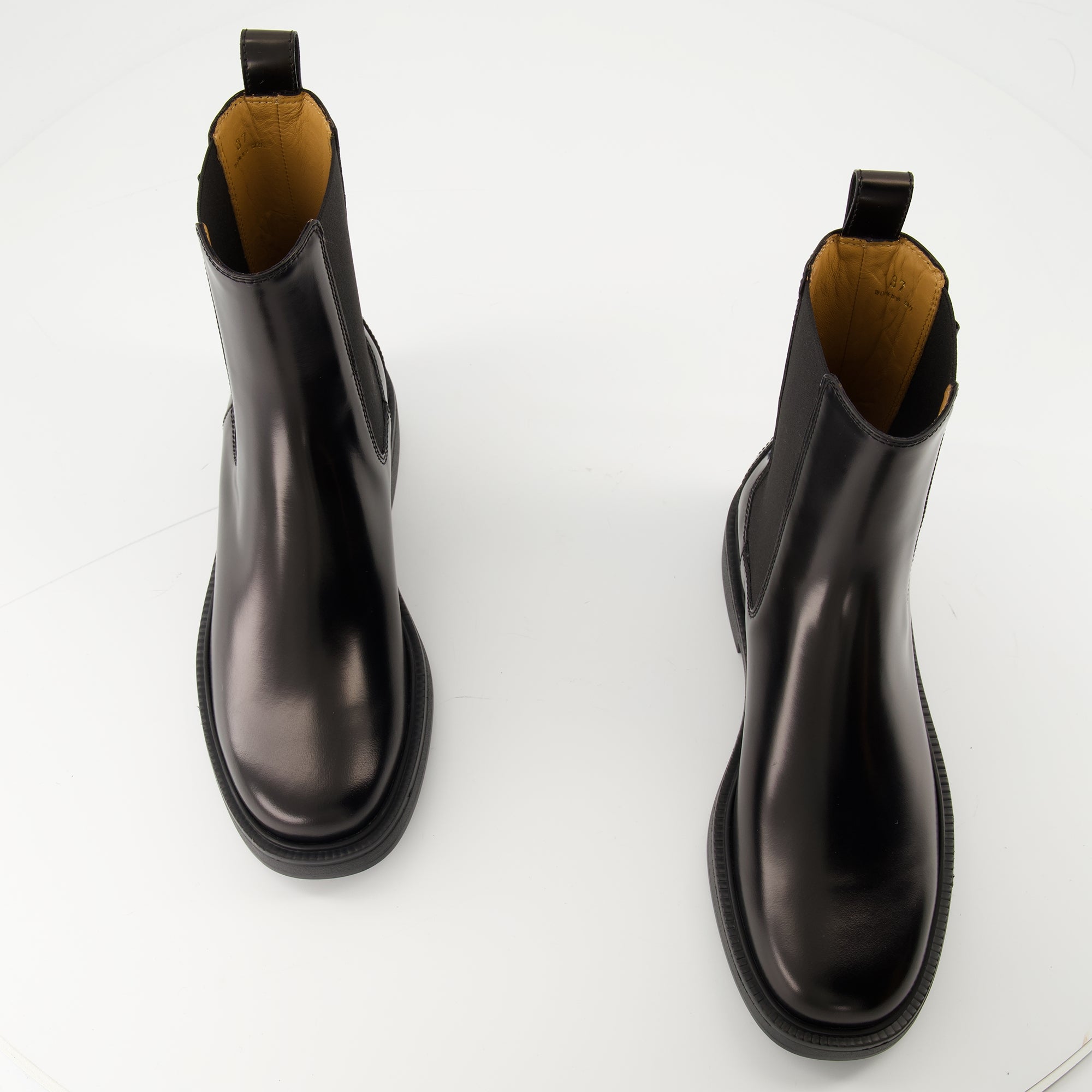 Image of Tod's Women's Leather Ankle Boots - Autumn-Winter 2025 - Pair of Shoes Top View