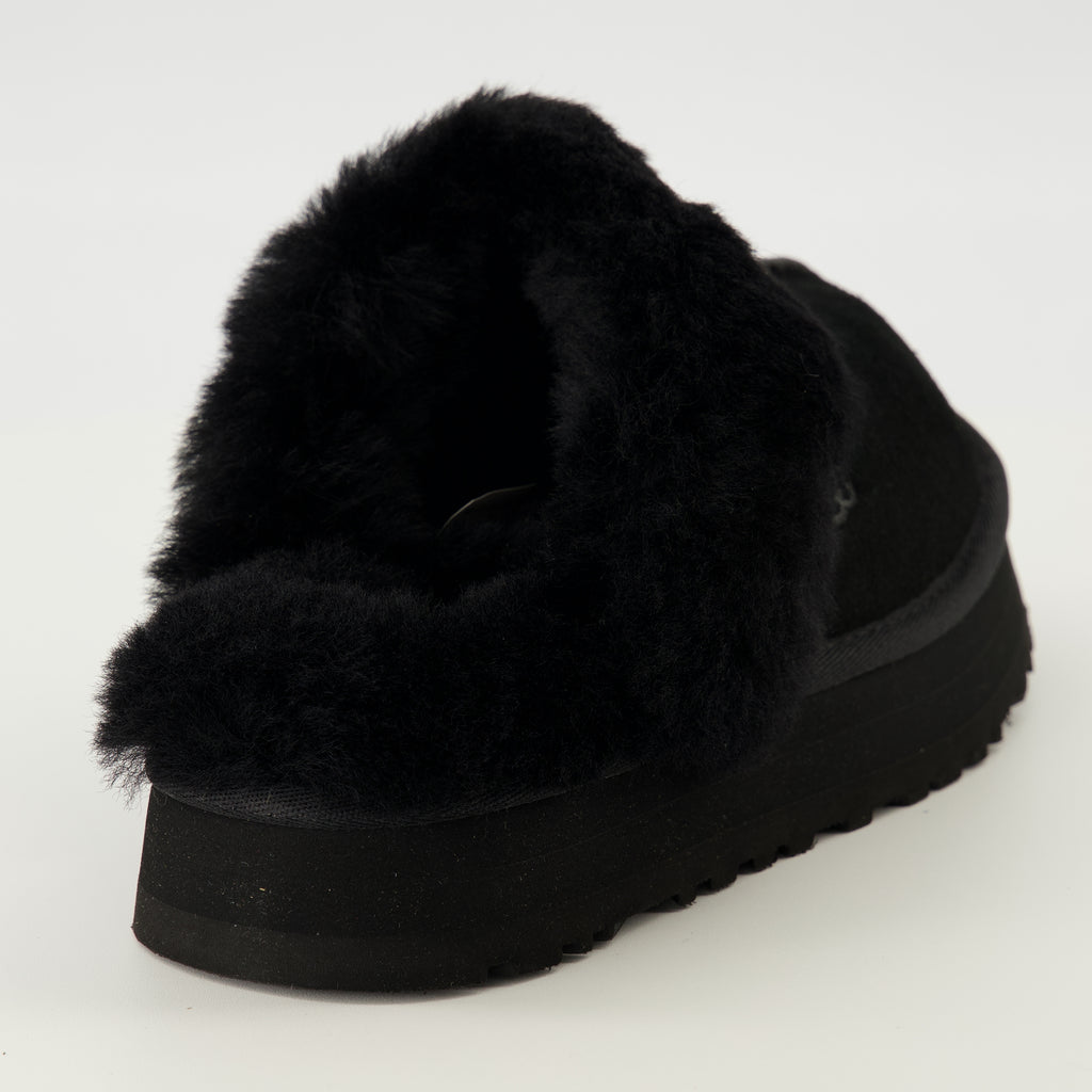 Uggの女性用黒ディスケットミュールの商品画像 - 2026年春夏シーズン - 後ろからのビュー