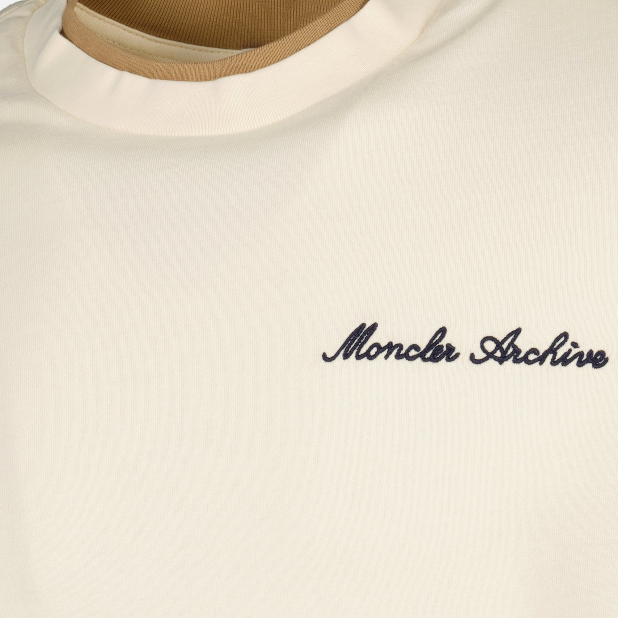 Image of the Moncler Men's embroidered beige T-shirt - Spring-Summer 2026 - Detailed View 1