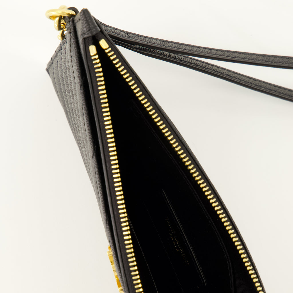 Pochettes Cassandre Leder-Clutch in Schwarz Saint Laurent Noir Femme