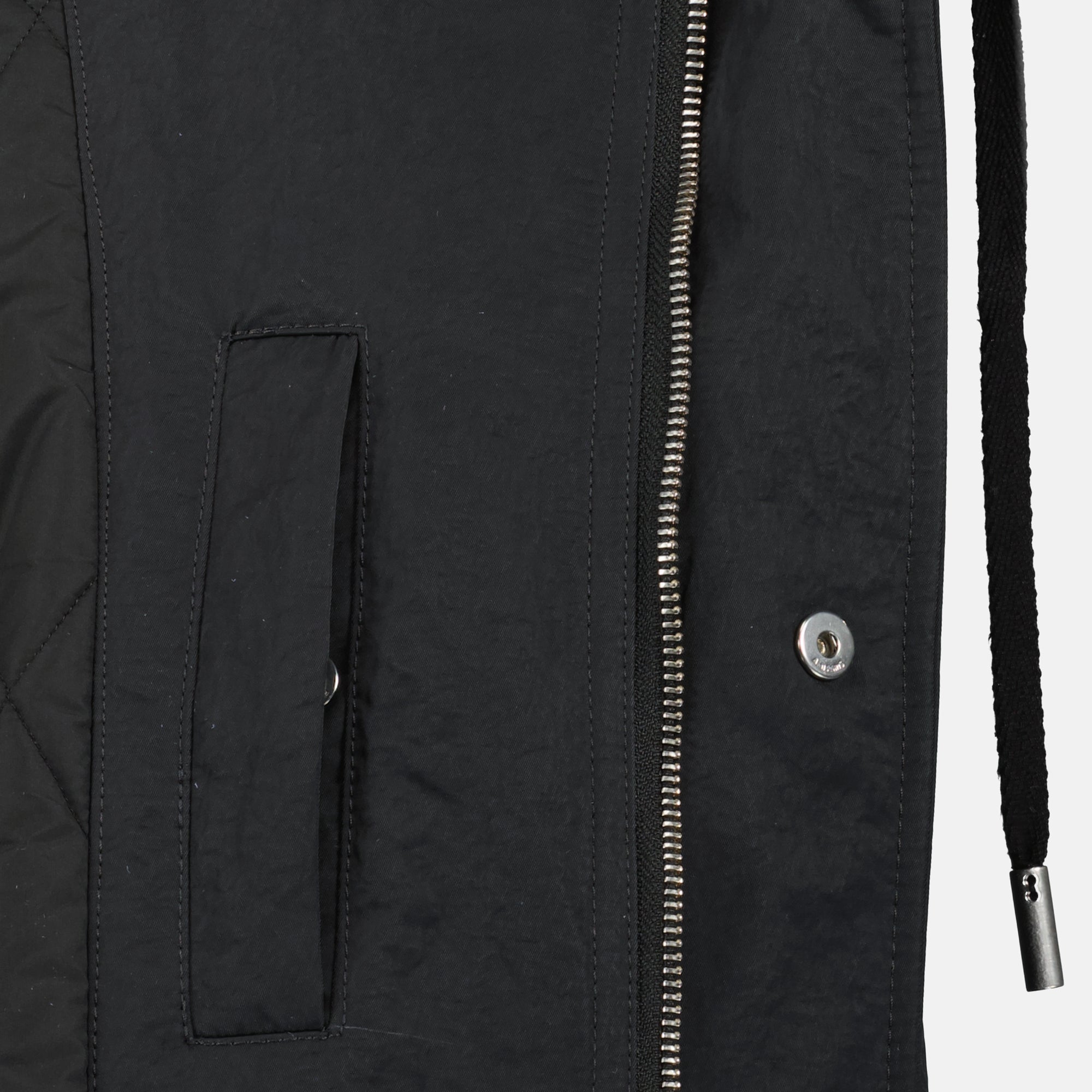 Image of the long parka from the brand Ami PARIS for Men - Autumn-Winter 2025 - Detailed View 7
