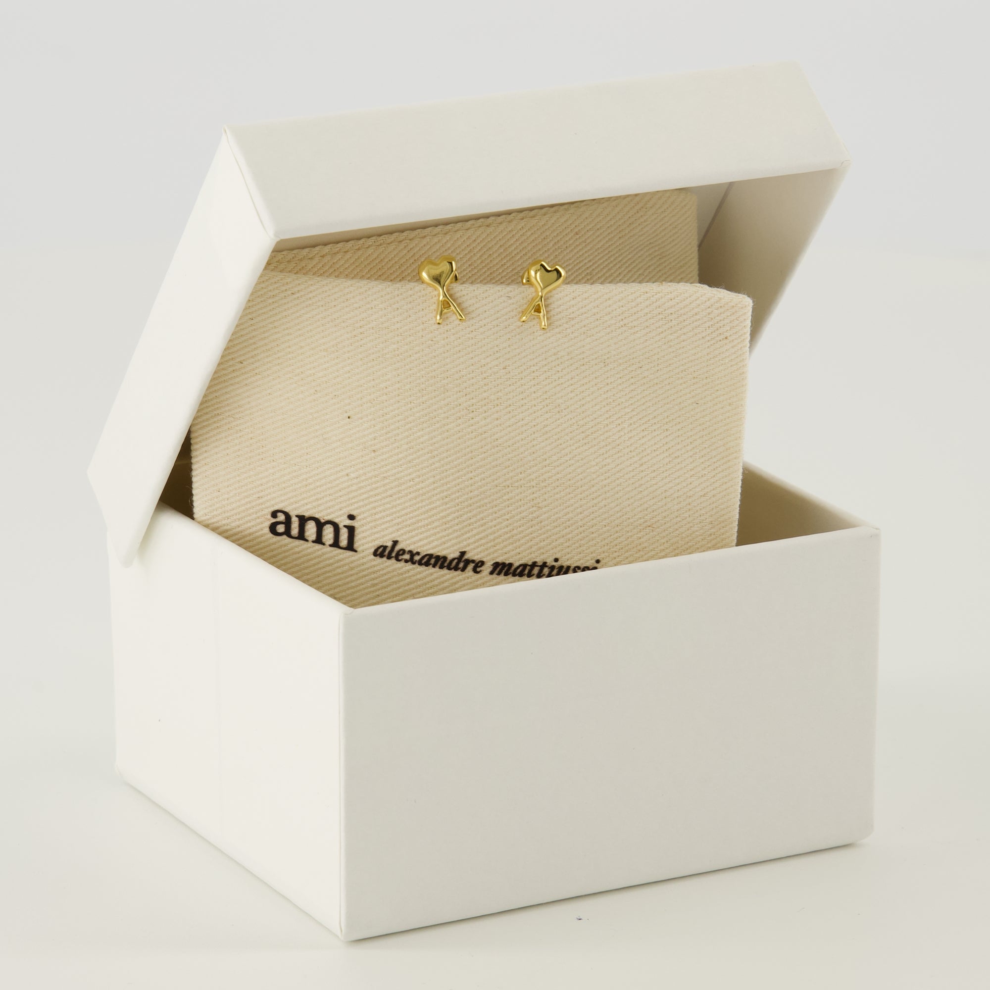 Image of the item Golden Heart Friend Earrings by the brand Ami PARIS for Women - Spring-Summer 2026 - Detailed View_3