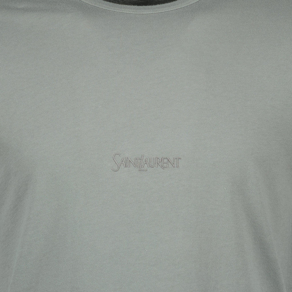 Image of the gray embroidered T-shirt from the brand Saint Laurent for Men - Fall-Winter 2025 - Detailed View_1