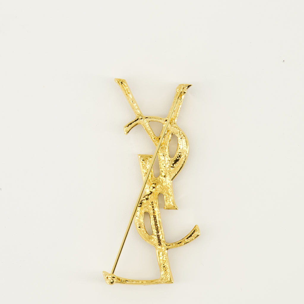 Image de l'article Broche Cassandre crocodile en métal doré de la marque Saint Laurent pour Unisex - Saison Printemps-Été 2026 - Vue de Dos