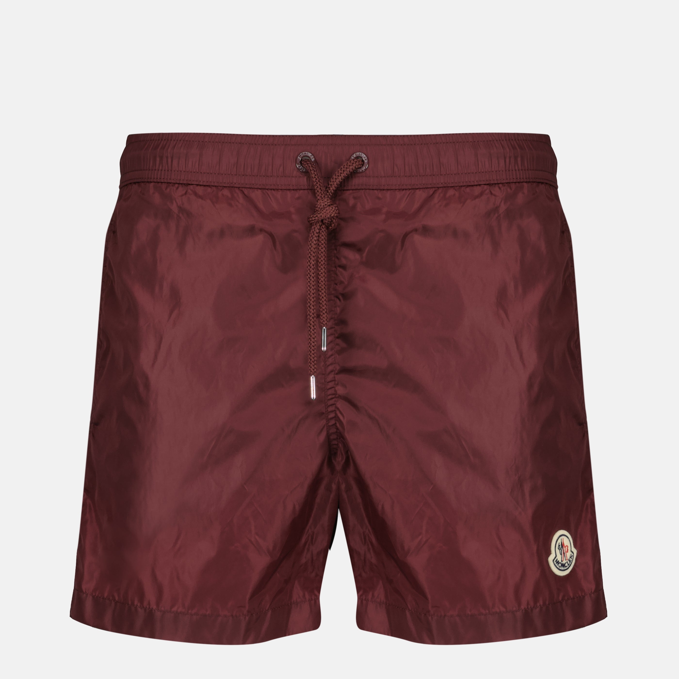 Image of the Moncler Men's Burgundy Logo Nylon Swim Shorts - Spring-Summer 2026 - Front View