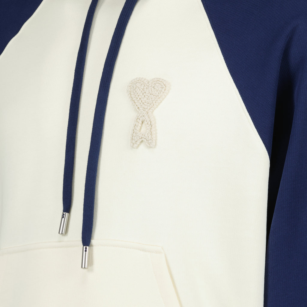 Image of the AMI Heart Hoodie made of cotton from the brand Ami PARIS for Unisex - Spring-Summer Season 2026 - Detailed View_1