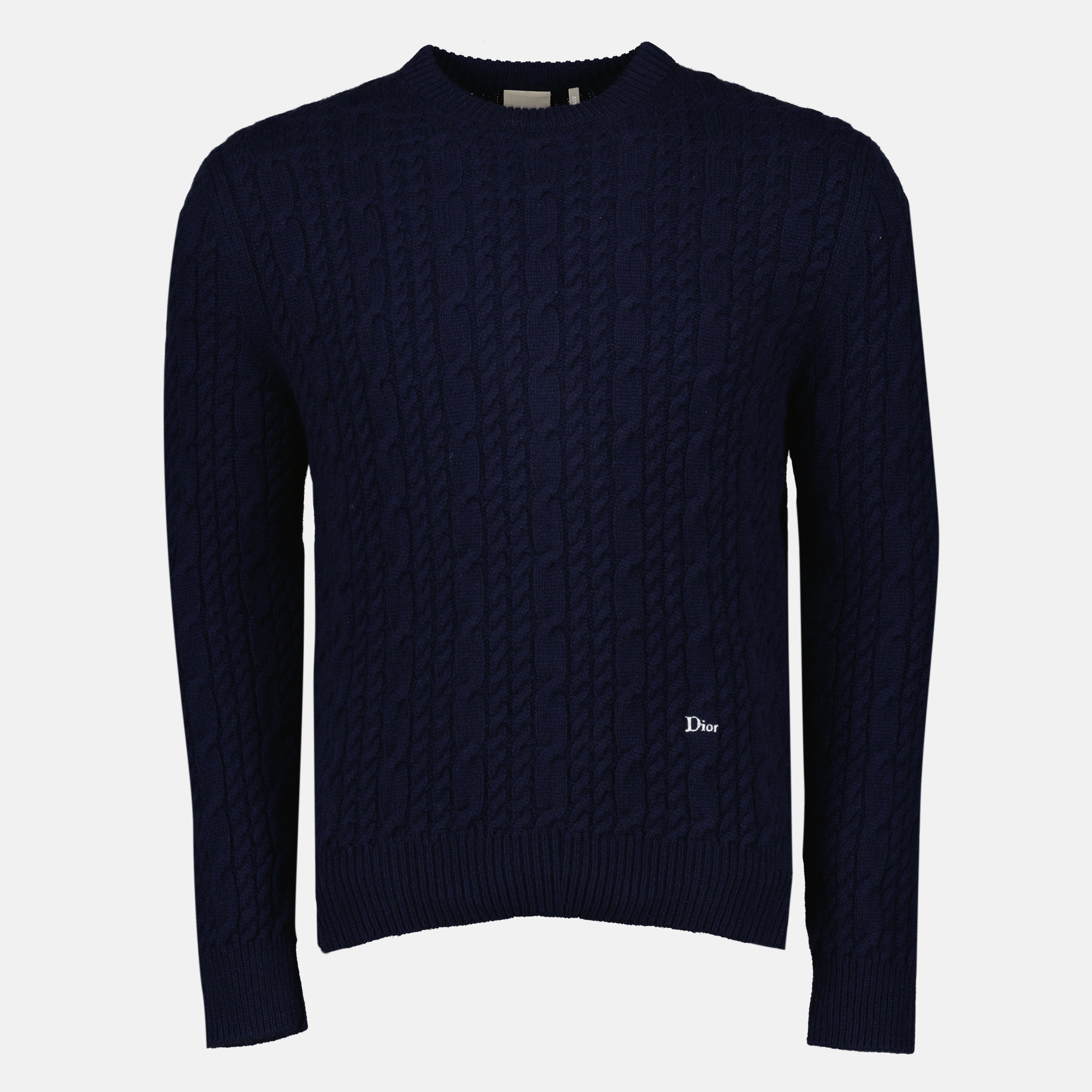 Image of the navy blue knitted sweater from the brand Dior for Men - Spring-Summer 2026 - Front View