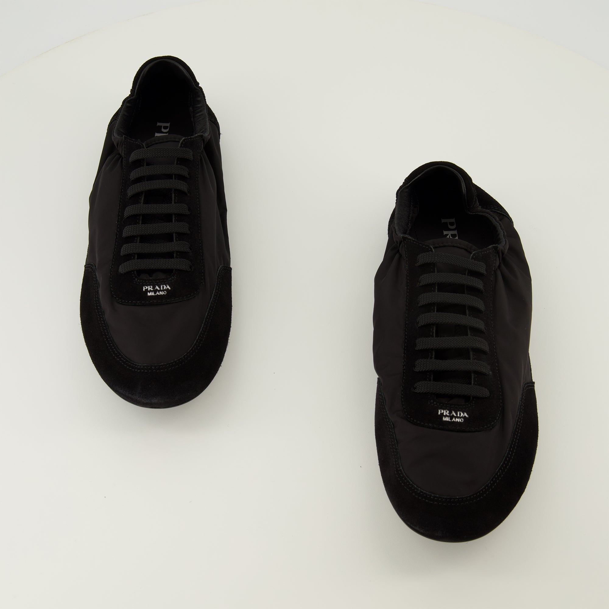 Image de l'article Baskets Collapse noir de la marque Prada pour Homme - Saison Printemps-Été 2026 - Vue de dessus paire de chaussure
