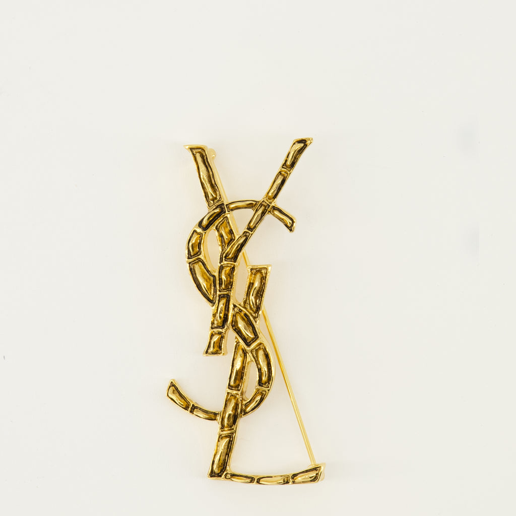 Image de l'article Broche Cassandre crocodile en métal doré de la marque Saint Laurent pour Unisex - Saison Printemps-Été 2026 - Vue de Face