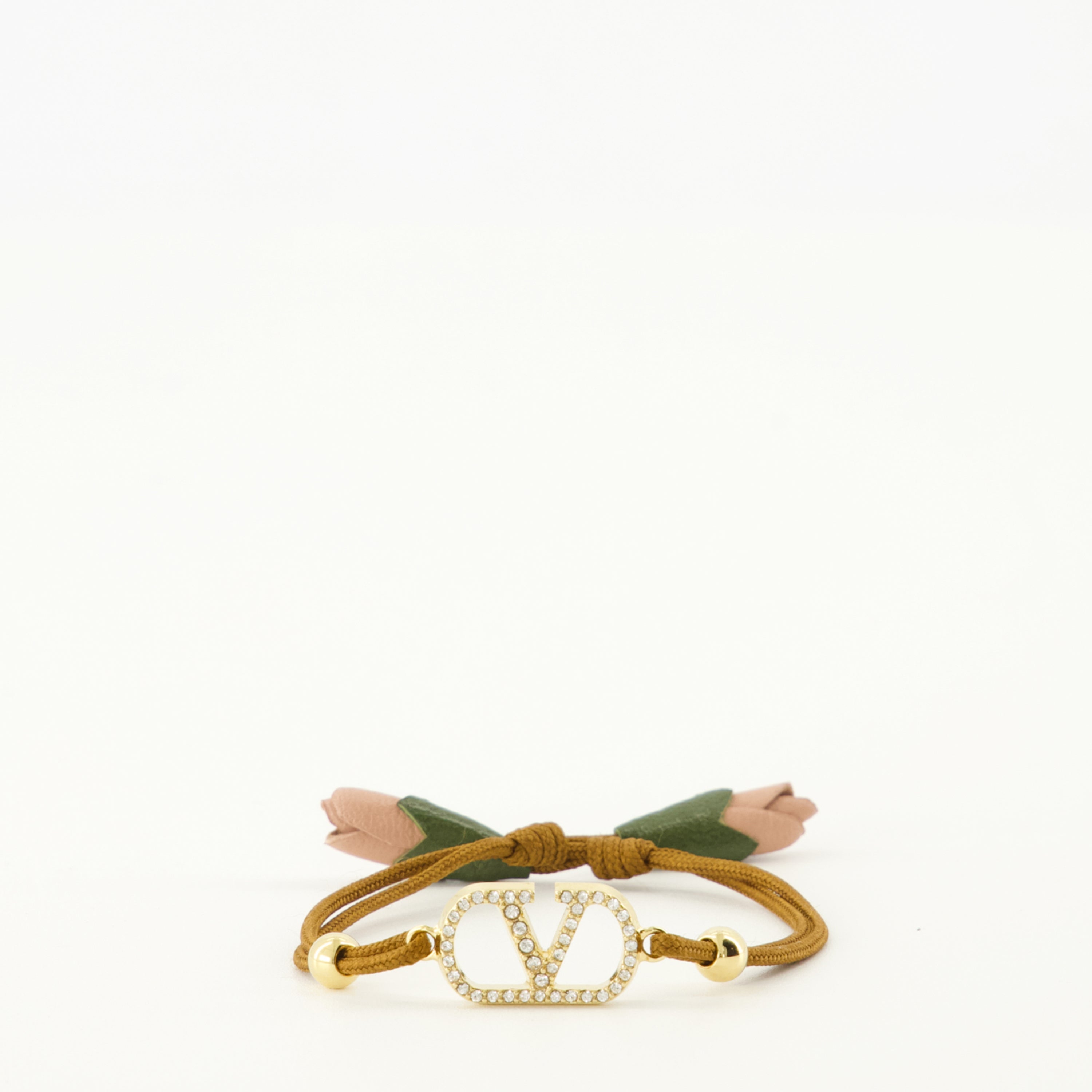 Image of the Vlogo Bracelet with brown cord by Valentino Garavani for Women - Spring-Summer 2026 - Front View