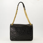 Imagem da mala Niki medium em couro vintage da marca Saint Laurent para Mulheres - Temporada Outono-Inverno 2025 - Vista Traseira