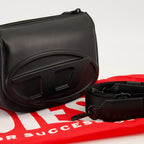 Image of the 1DR bag in black leather and denim by Diesel for Unisex - Spring-Summer 2026 - Detailed View 2