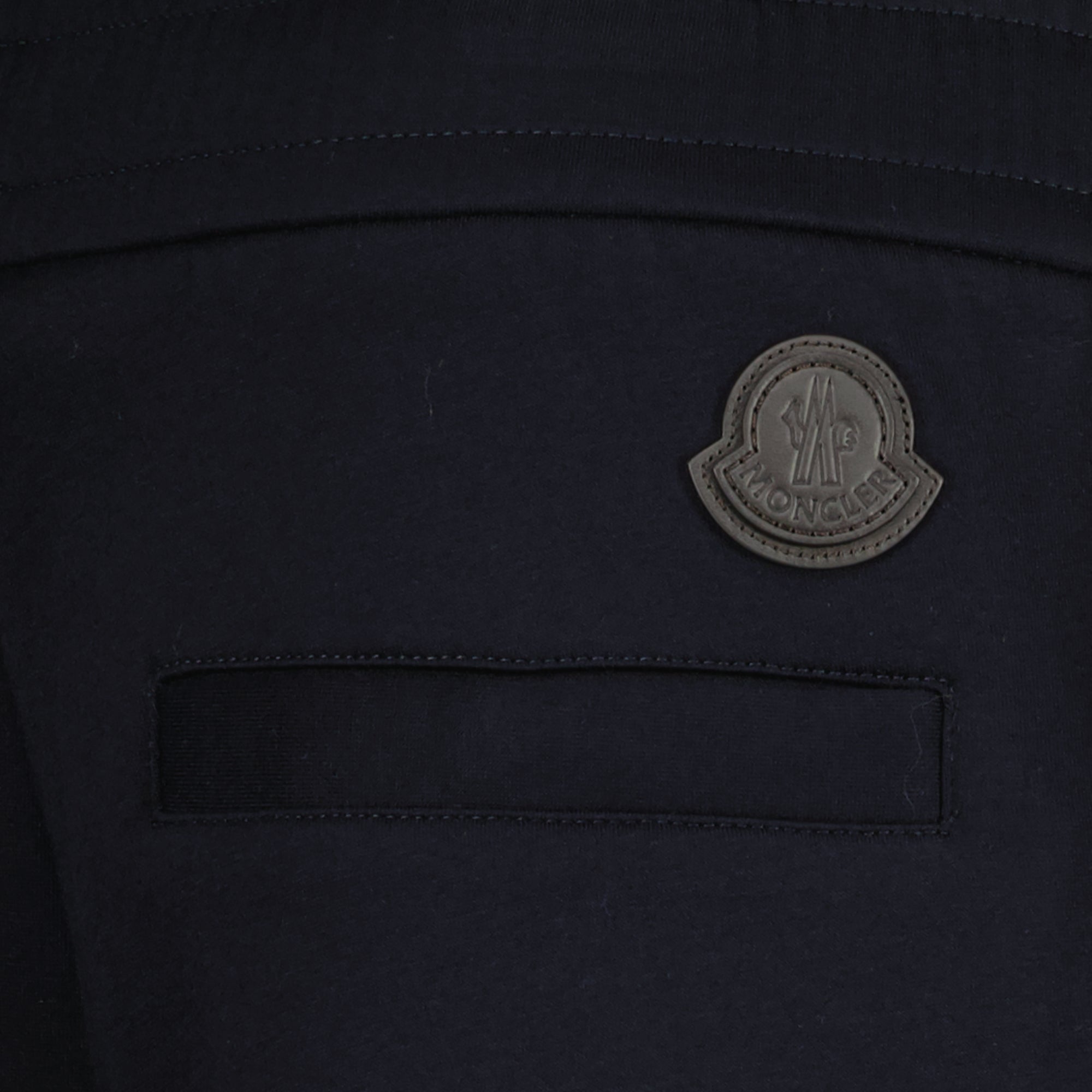 Image of the Moncler Men's Navy Blue Tracksuit Pants - Spring-Summer 2026 - Detailed View_1