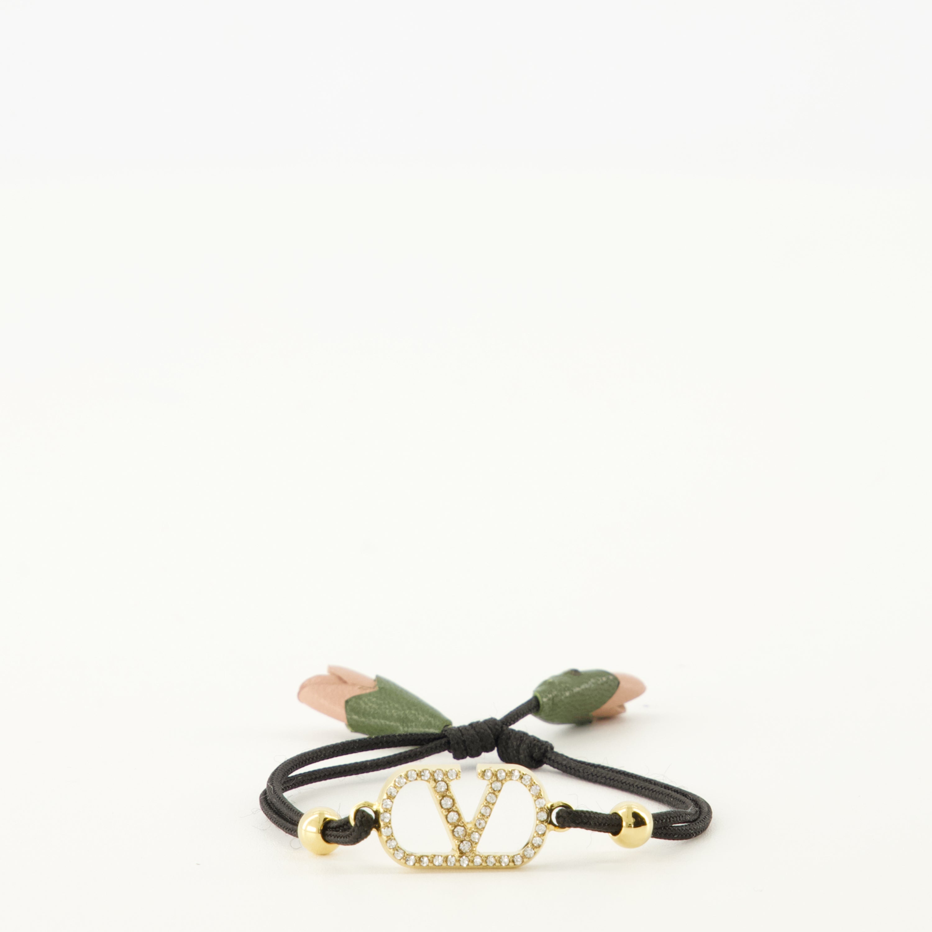 Image of the Vlogo bracelet with black cord from the brand Valentino Garavani for Women - Spring-Summer 2026 - Front View