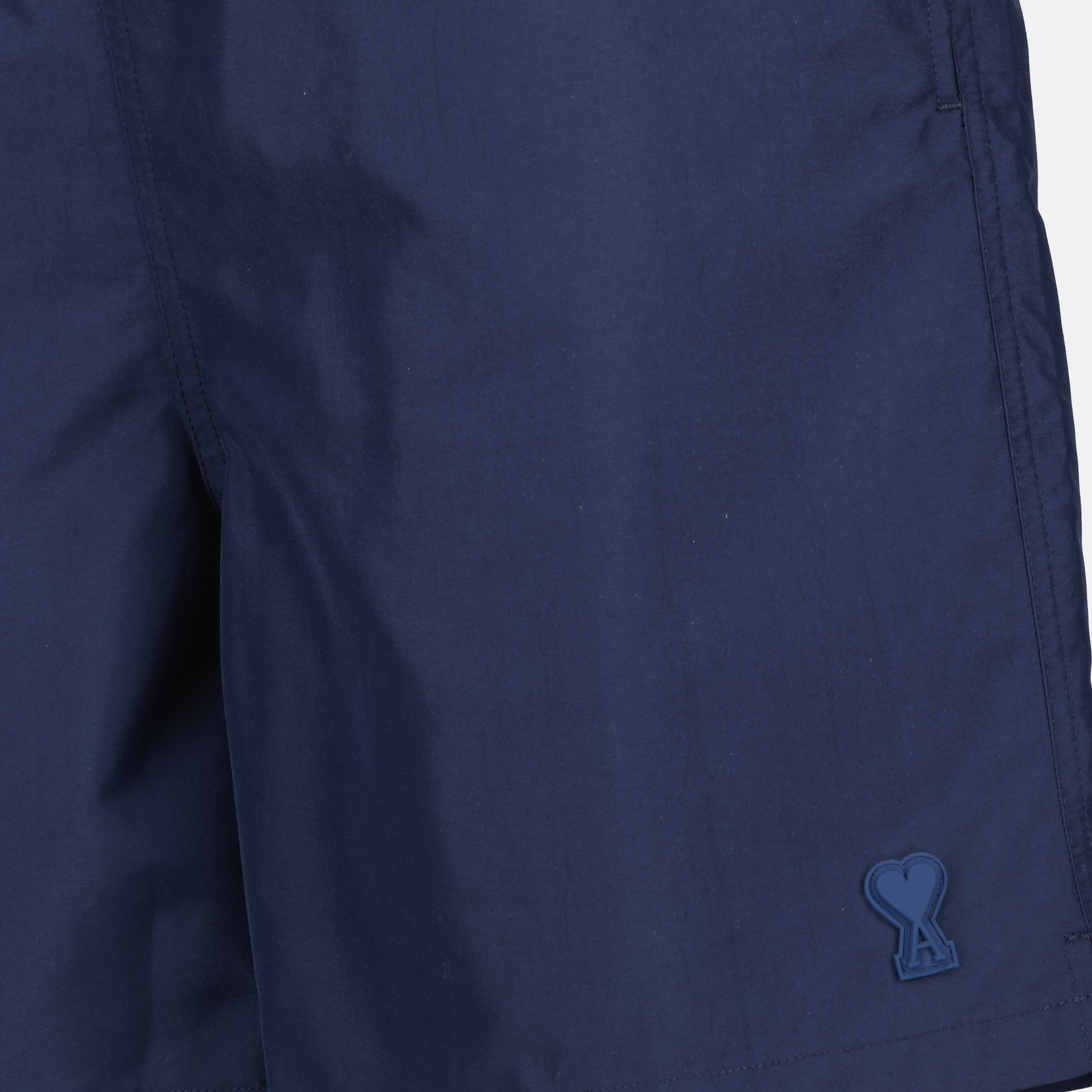 Image of the navy blue swimsuit by Ami PARIS for Men - Spring-Summer 2026 - Detailed View_1