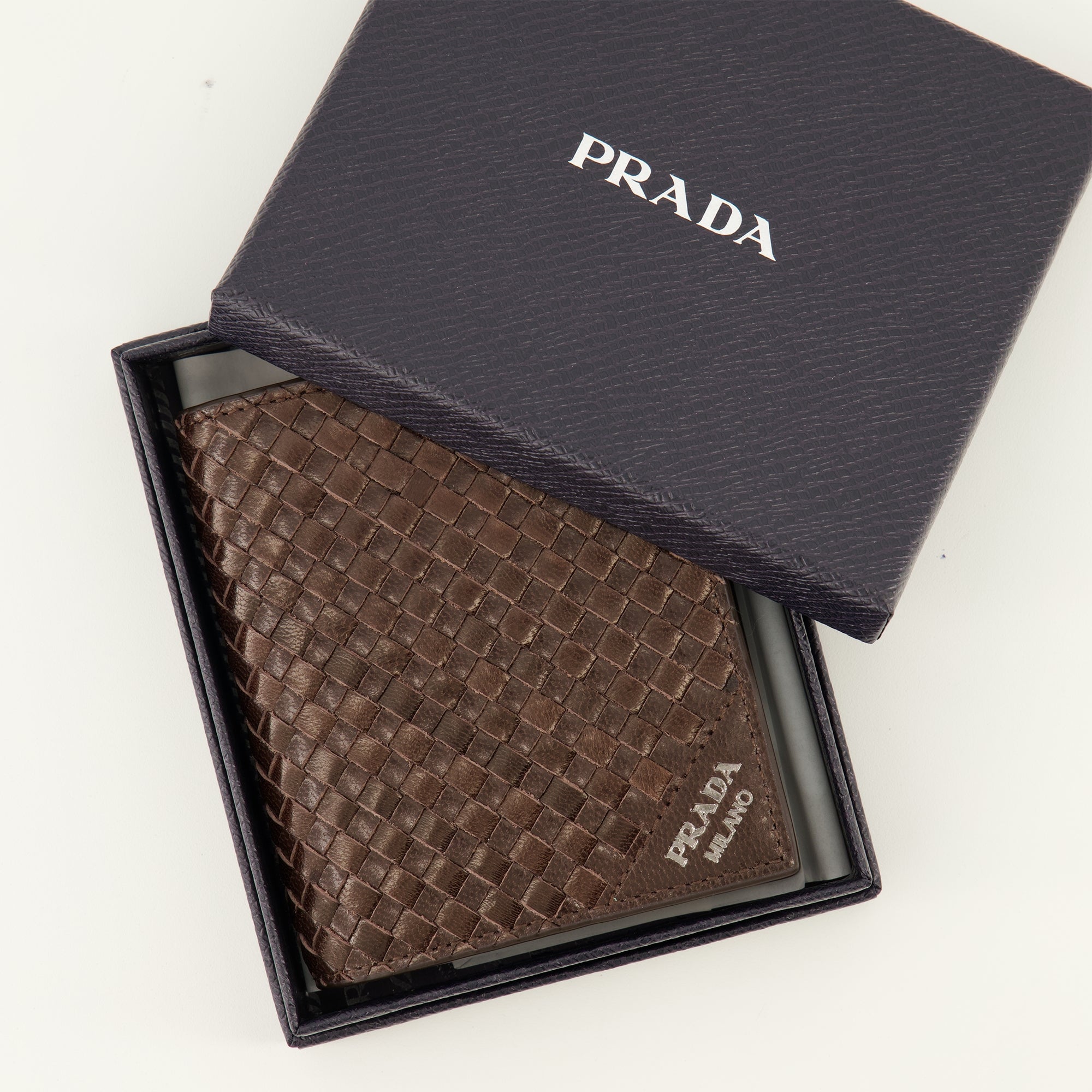 Petite maroquinerie Portefeuilles en cuir marron Prada Marron Homme