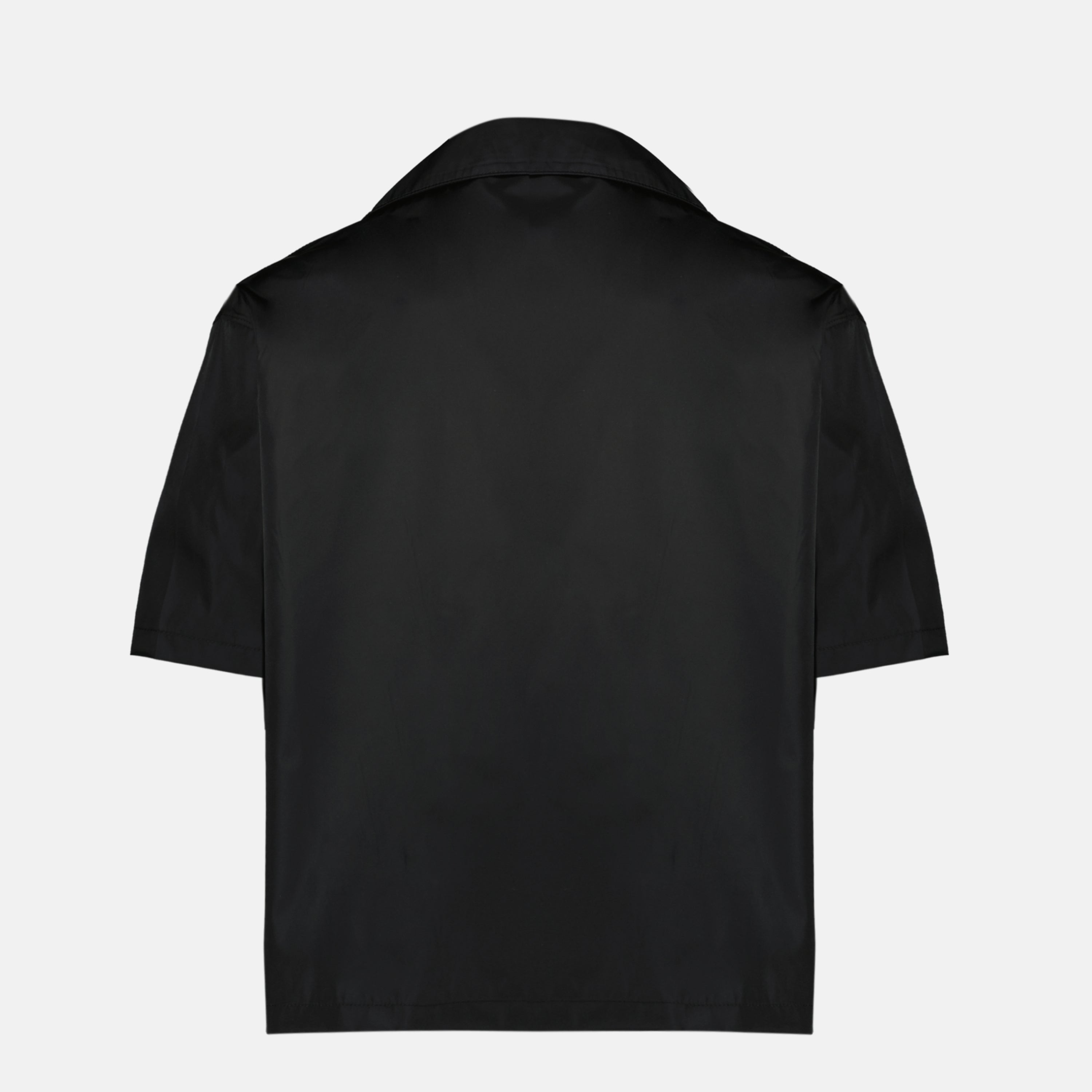 Image of the black nylon shirt from the brand Prada for Men - Spring-Summer 2026 - Back View