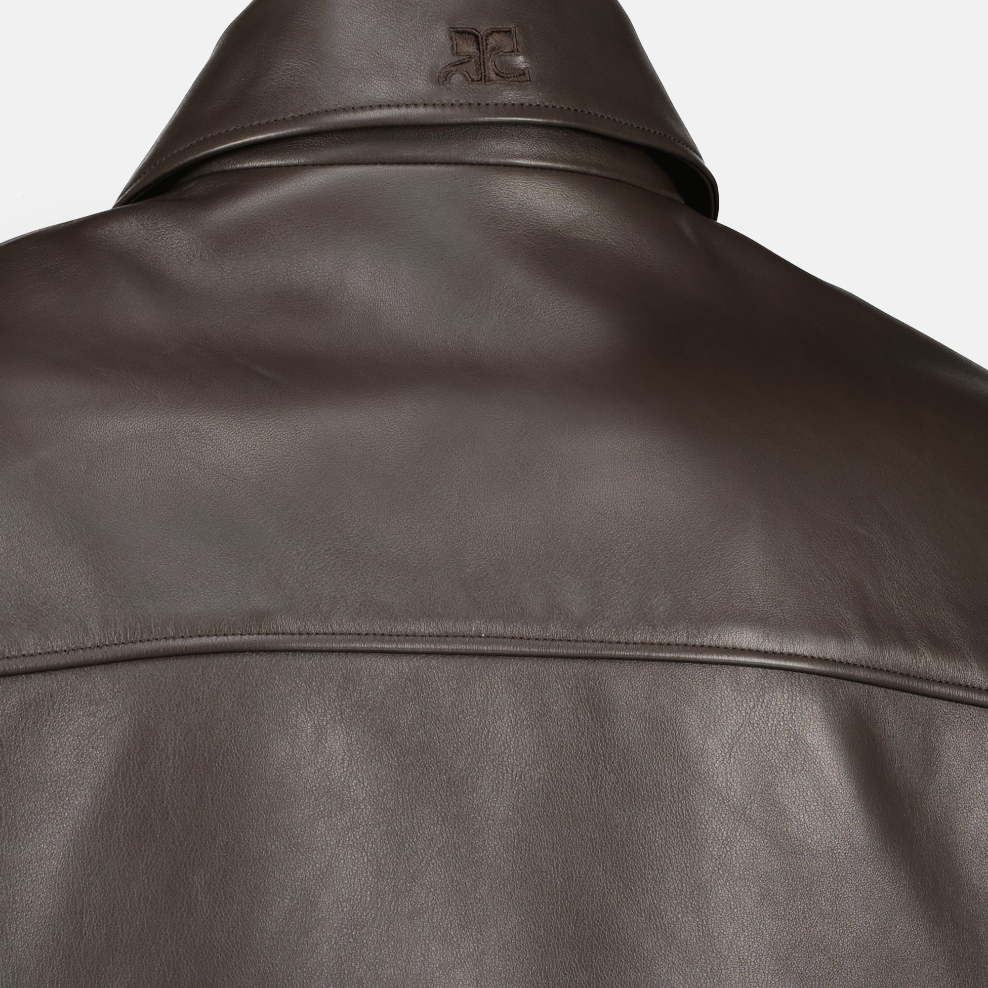 Image of the item Brown leather zip jacket by Courrèges for Men - Spring-Summer 2026 - Detailed view_2