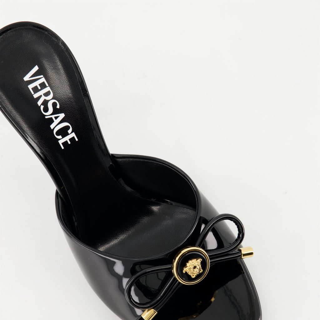 Open shoes Bow Heeled Mules Versace Black Femme