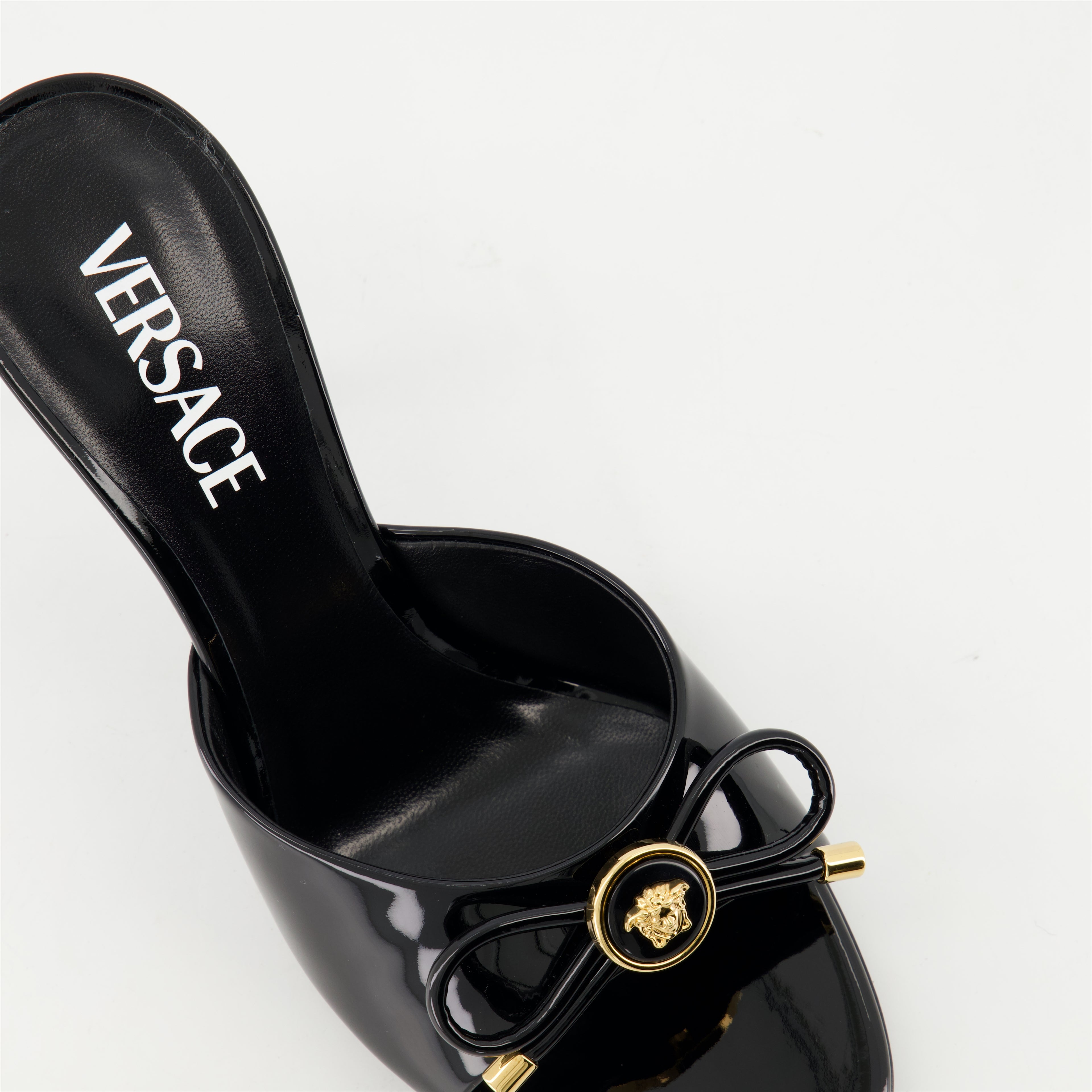 Open shoes Bow Heeled Mules Versace Black Femme