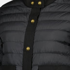 Imagen de la chaqueta corta de plumas Juju negra de la marca Moncler para mujer - Temporada Primavera-Verano 2026 - Vista Detallada 1