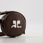 Sacs bandoulière Sac cercle Réédition Courrèges Marron Unisexe