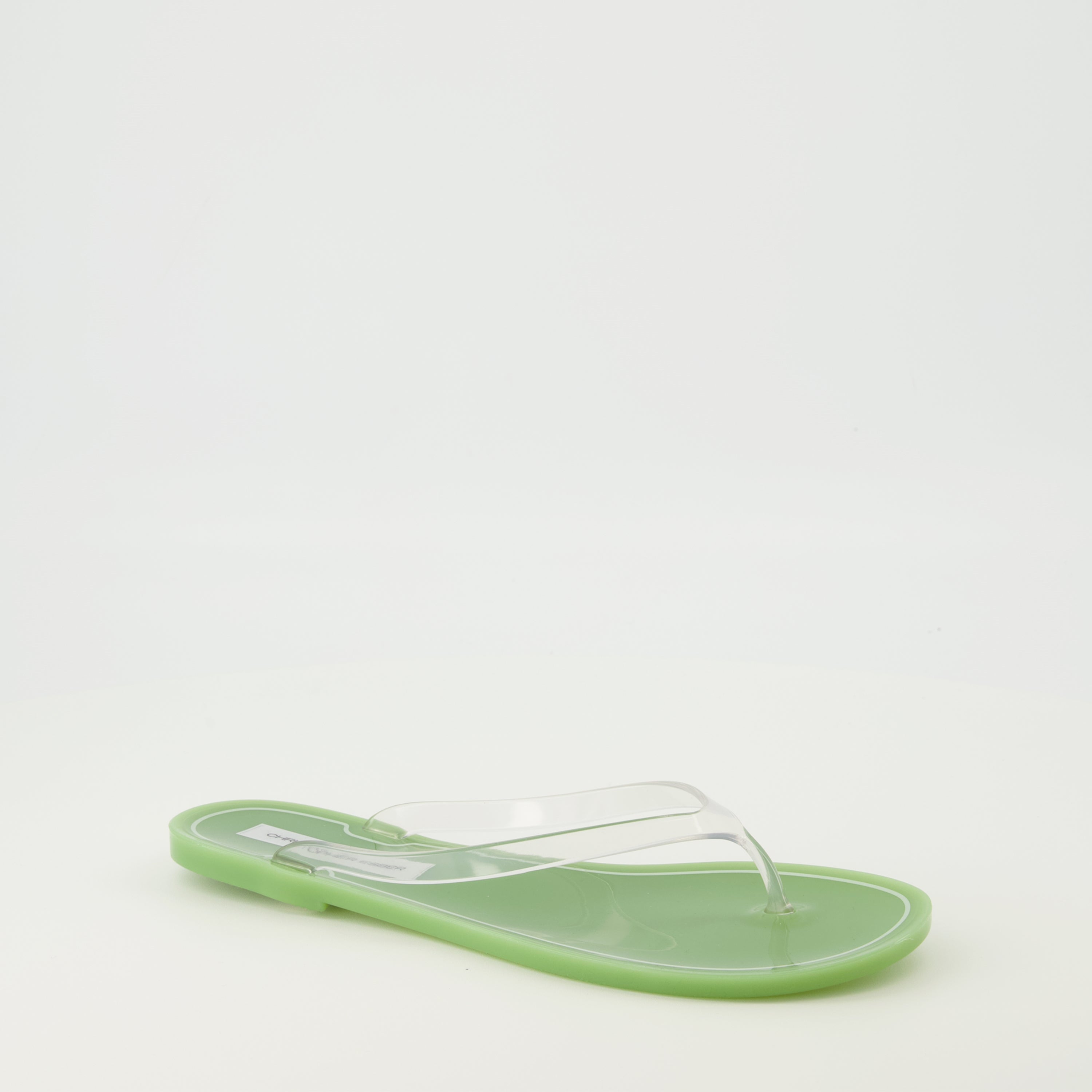Image de l'article Tongs Jo en PVC vert de la marque Christopher Esber pour Femme - Saison Printemps-Été 2026 - Vue trois quarts avant droite