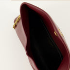 Sacs à main et épaule Cassandre Clutch Saint Laurent Rouge Femme