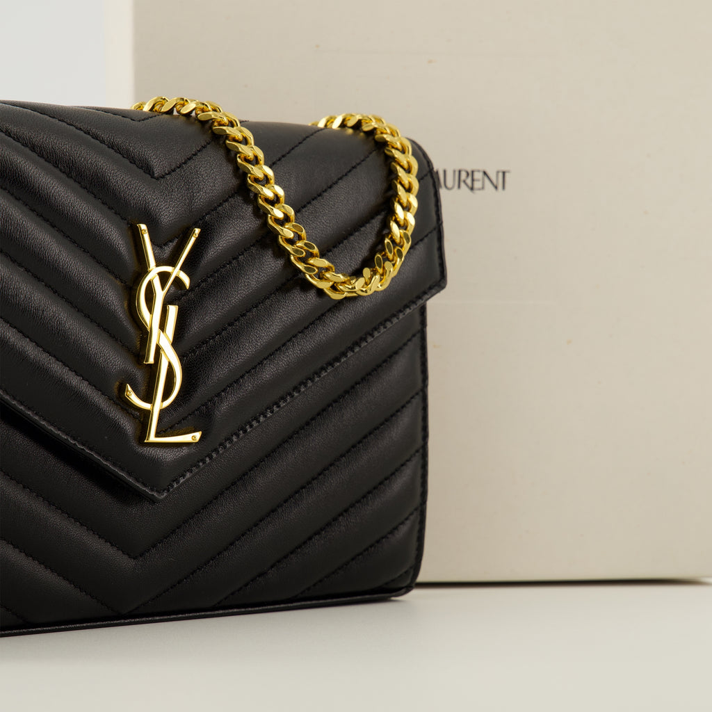 Image of the Cassandre black chain wallet from the Saint Laurent brand for Women - Fall-Winter 2025 - Detailed View_2