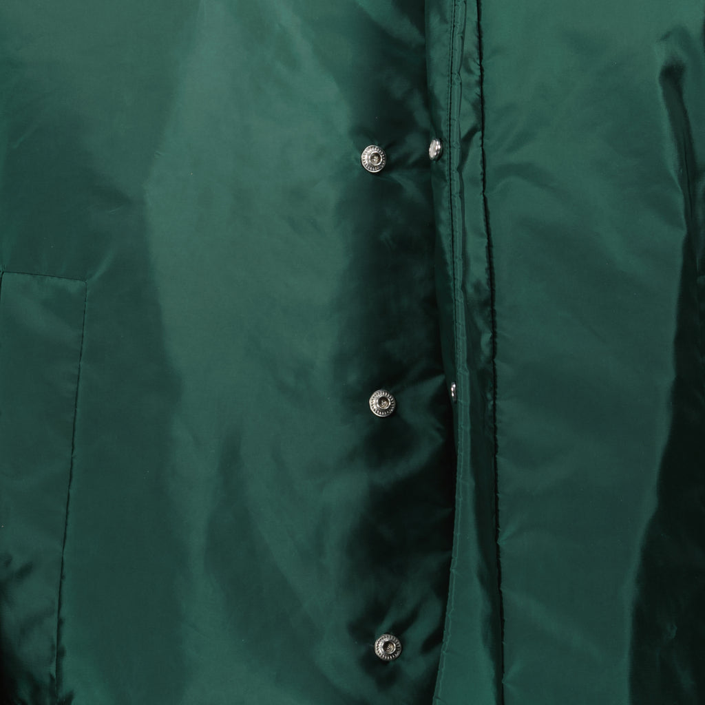 Image of the Grandas green windbreaker from the Moncler brand for Men - Spring-Summer 2026 - Detailed View_2