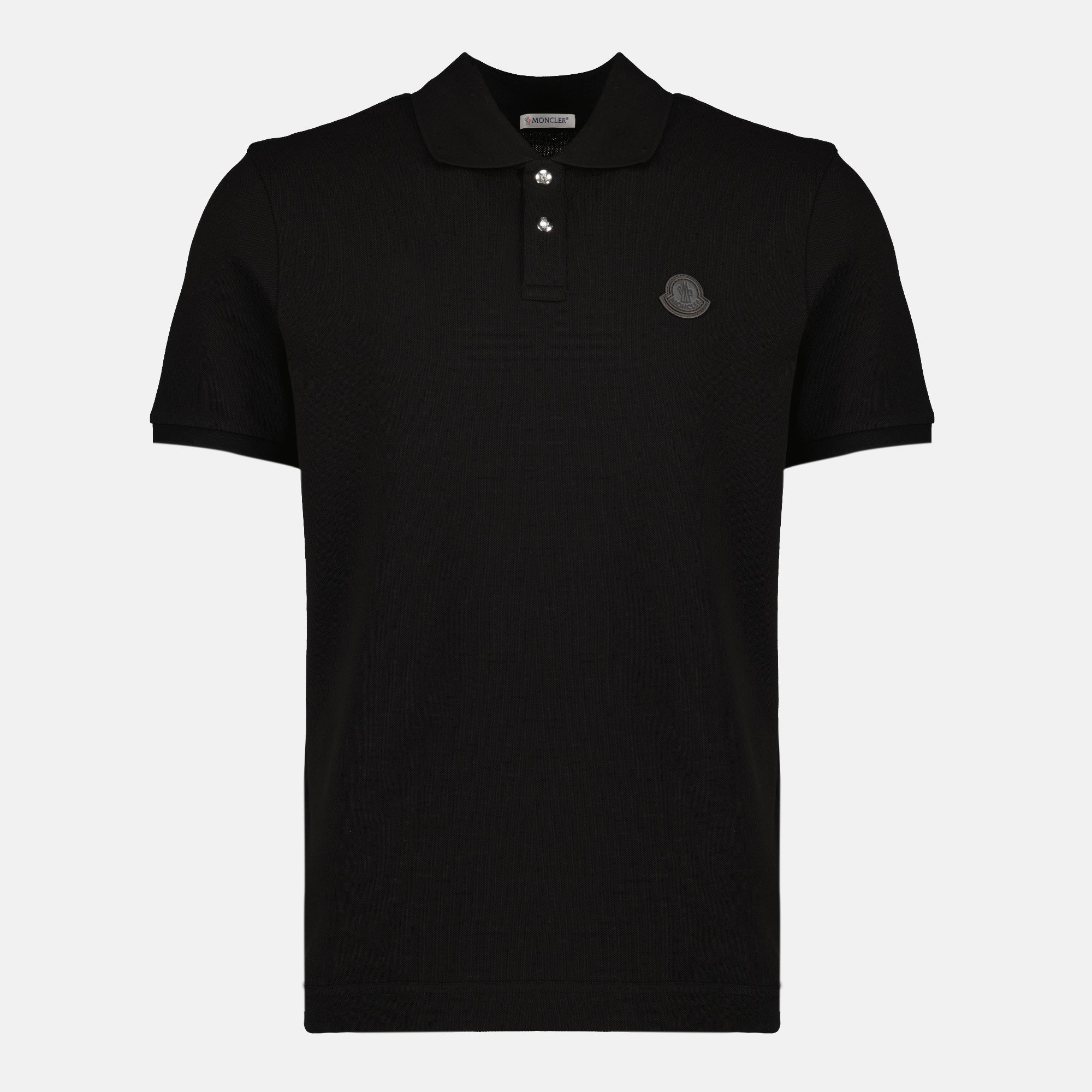 Image of the black logo cotton polo shirt from the brand Moncler for Men - Spring-Summer 2026 - Front View