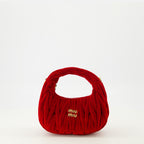 Imagen del mini bolso Wander en terciopelo acolchado rojo de Miu Miu para Mujer - Temporada Primavera-Verano 2026 - Vista Frontal