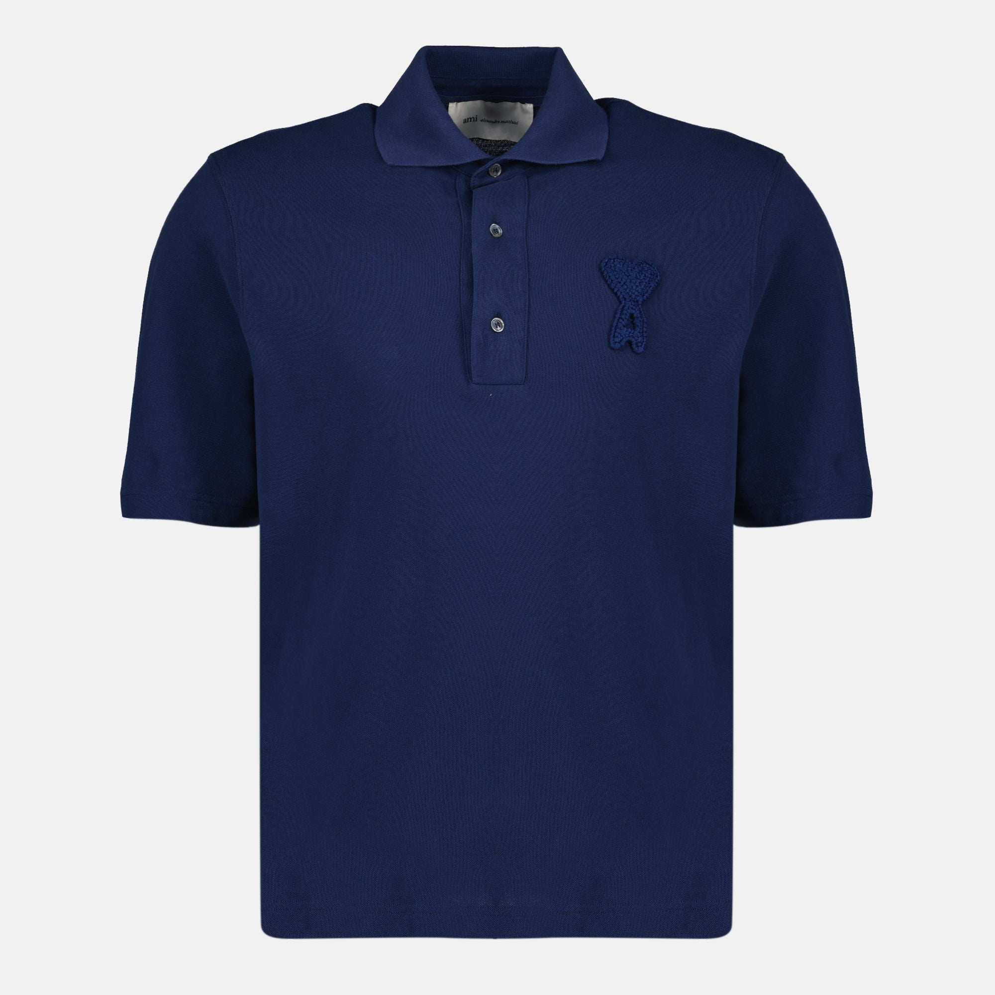 Image de l'article Polo AMI de coeur tissé bleu beige de la marque Ami PARIS pour Unisex - Saison Printemps-Été 2026 - Vue de Face