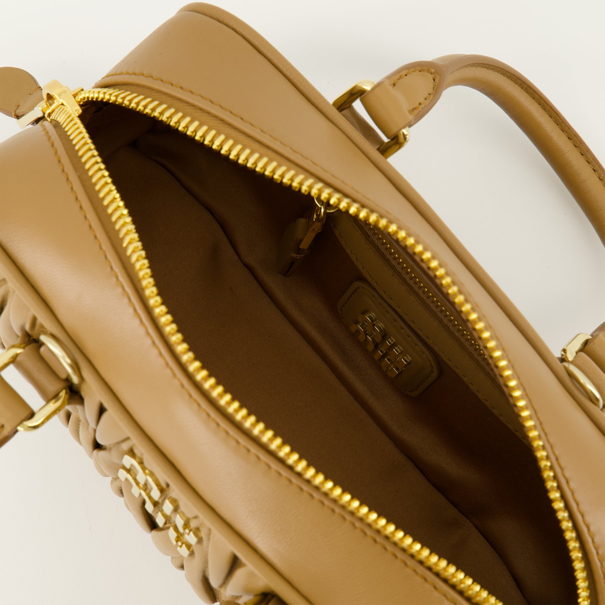 【美品】 miu miu ブラウンキャンバス×レザー バックパック保存袋と保証書 美品】 miu miu ブラウンキャンバス×レザー バックパック保存袋と保証書