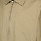 Immagine del blouson beige AMI a forma di cuore del marchio Ami PARIS per Uomo - Stagione Primavera-Estate 2026 - Vista Dettagliata_1