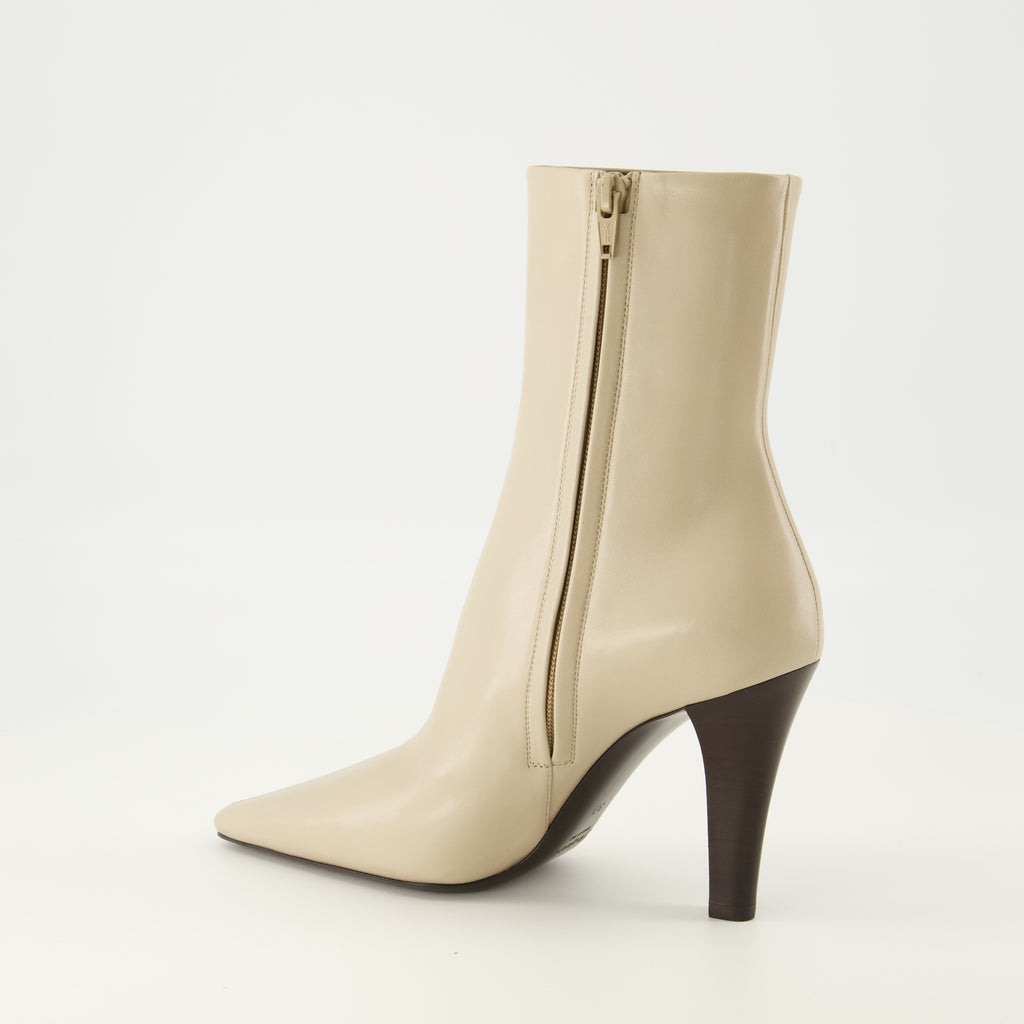 Image of the Jill ankle boots by Saint Laurent for Women - Autumn-Winter 2025 Season - Three-quarter right back view
