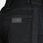 Image de l'article Jean droit en denim noir de la marque Mm6 pour Femme - Saison Automne-Hiver 2025 - Vue détaillée_1