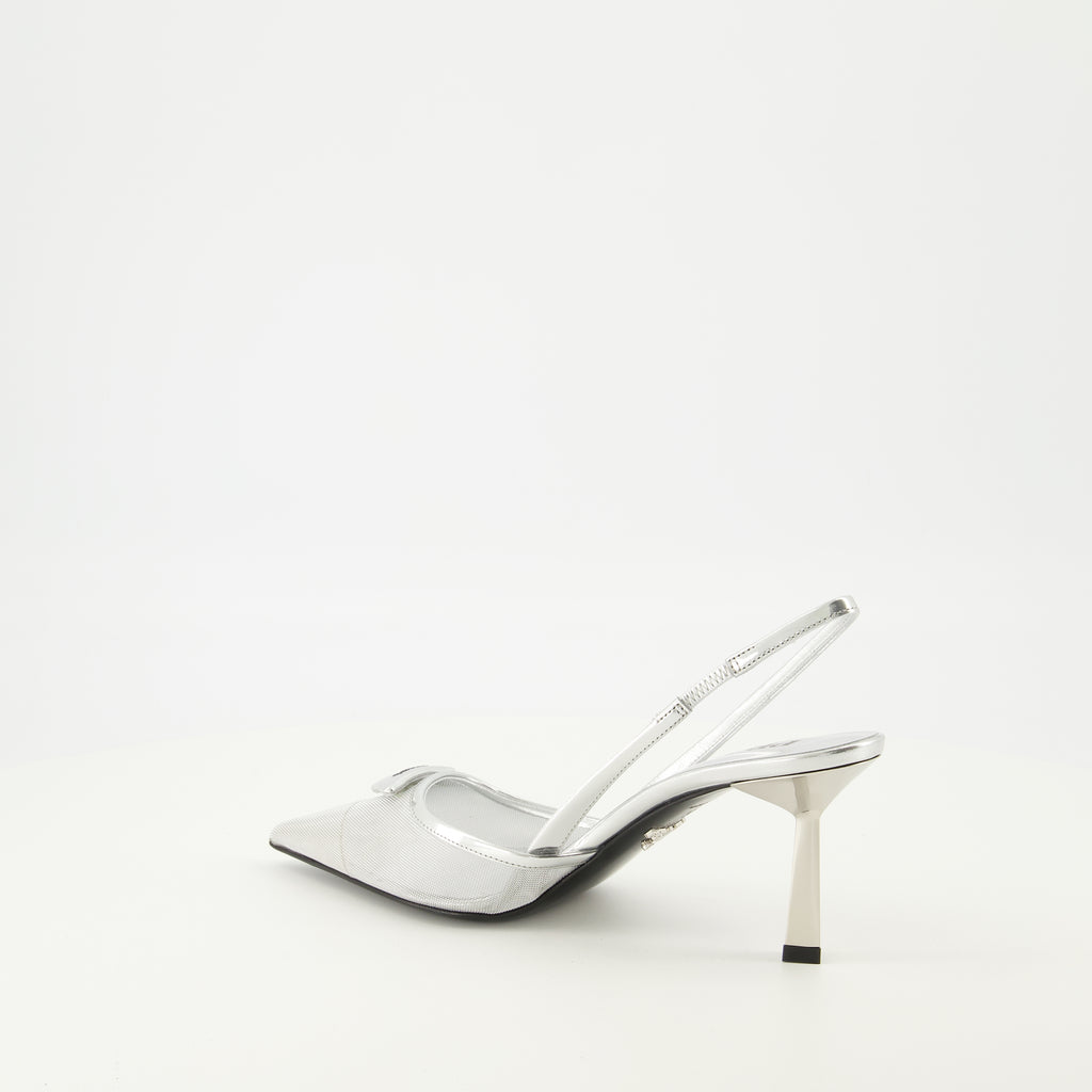 Immagine dei tacchi in rete argentata del marchio Prada per donna - Stagione Primavera-Estate 2026 - Vista tre quarti posteriore destra