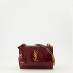 Imagen del bolso Sunset de Saint Laurent en cuero charol burdeos para Mujer - Temporada Otoño-Invierno 2025 - Vista Frontal
