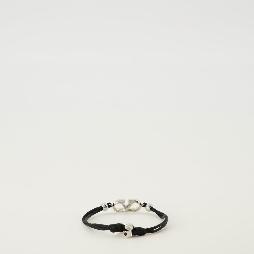 Image of the VLogo bracelet with black cord from the brand Valentino Garavani for Men - Spring-Summer 2026 - Back View