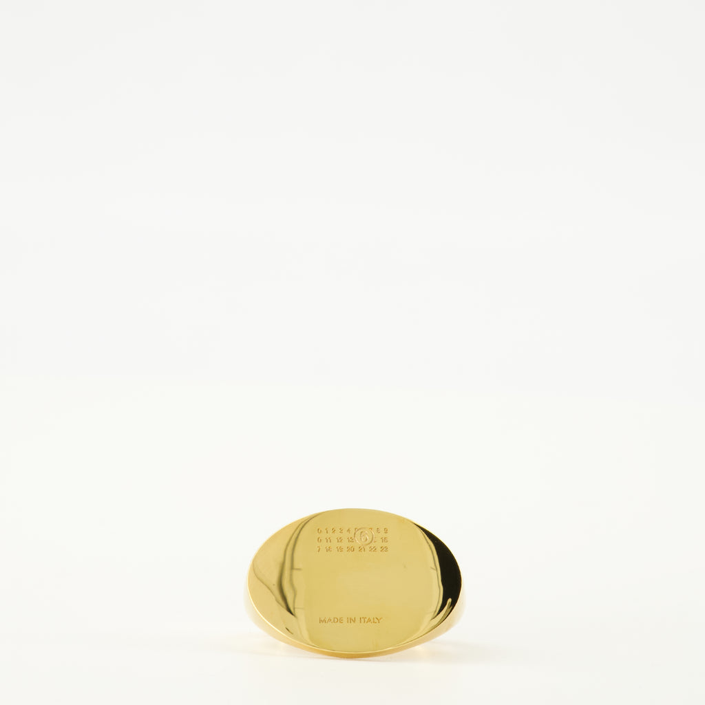 Image de l'article Chevalière Ovale doré de la marque Mm6 pour Femme - Saison Automne-Hiver 2025 - Vue de Face