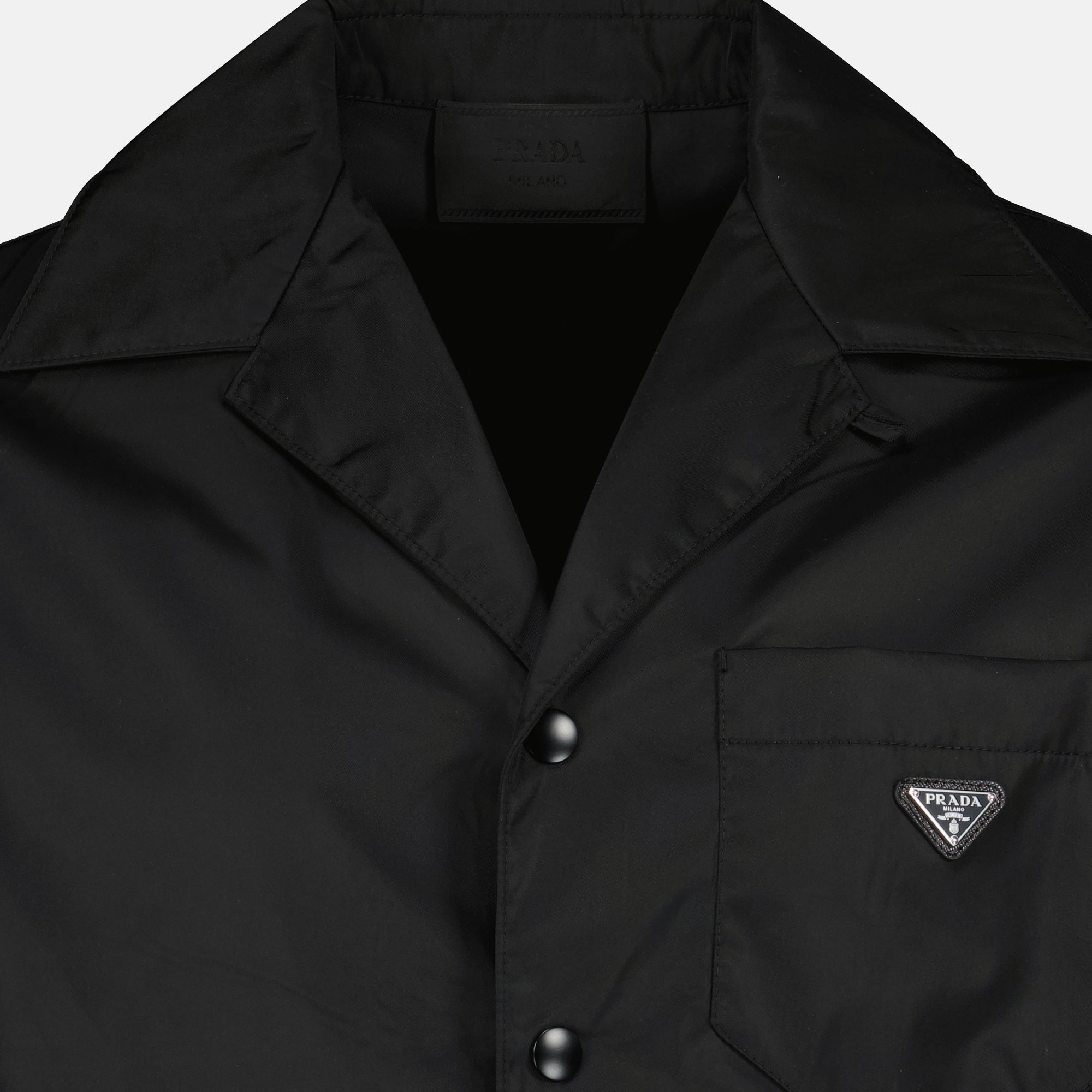 Image of the black nylon shirt from the brand Prada for Men - Spring-Summer 2026 - Detailed View_1