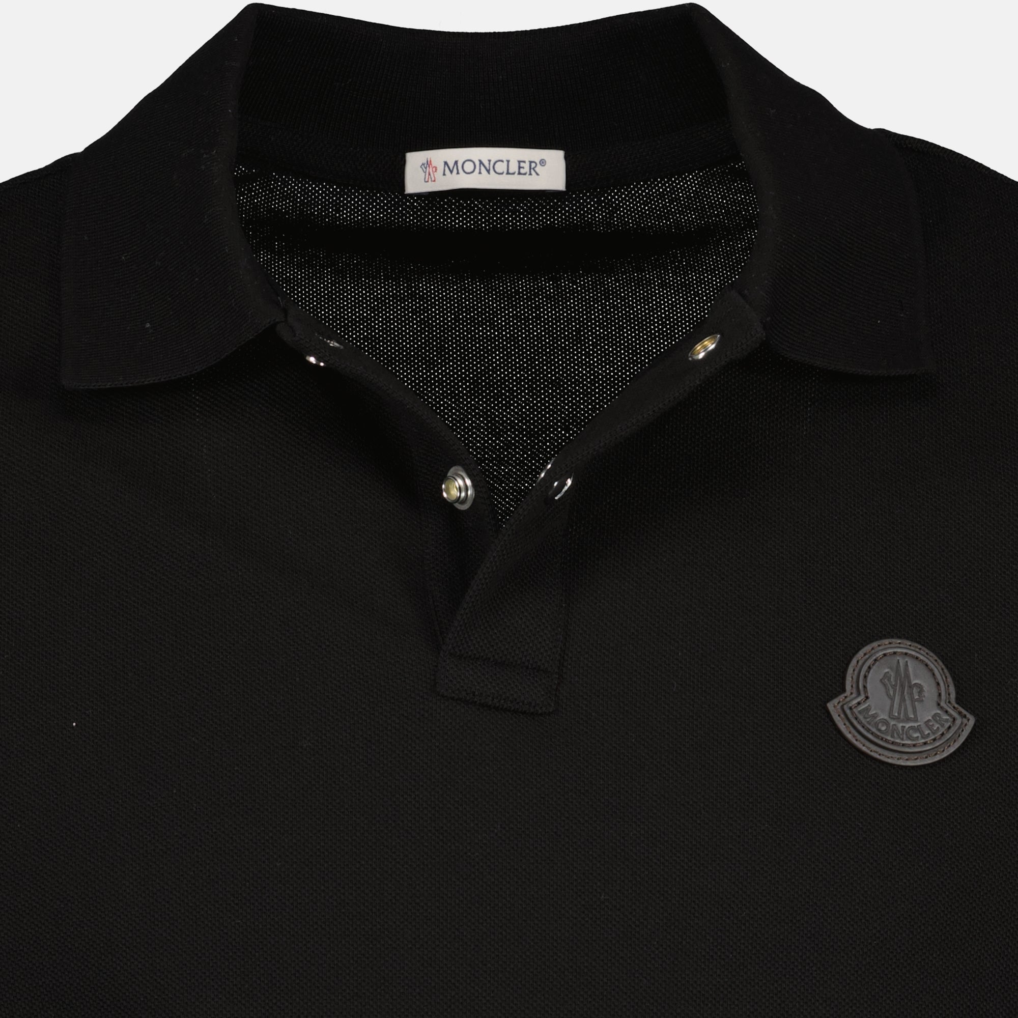 Image of the black logo cotton polo shirt from the brand Moncler for Men - Spring-Summer 2026 - Detailed View 2
