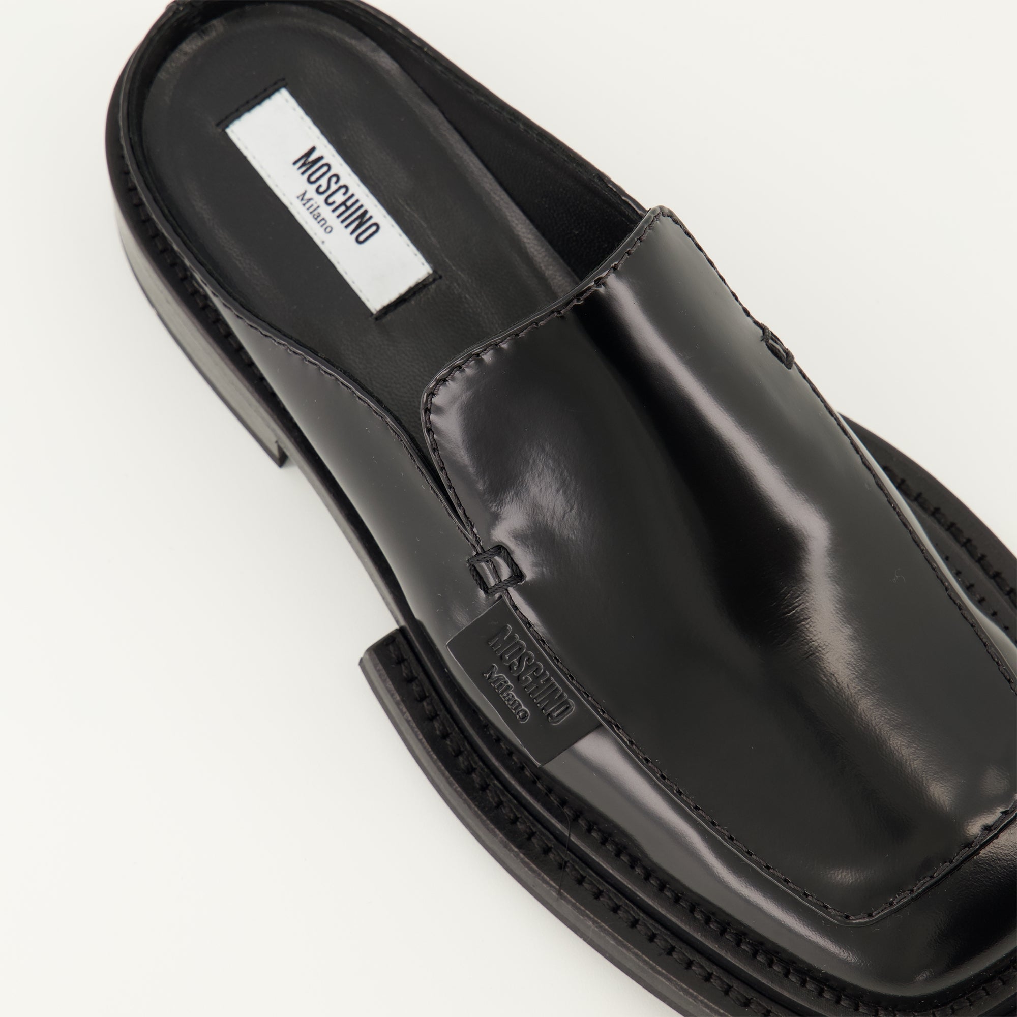 Image de l'article Mules en cuir de la marque Moschino pour Femme - Saison Automne-Hiver 2025 - Vue arrière