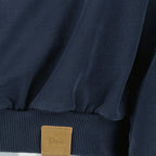 Image of the Dior Men’s Navy Blue Cowl Neck Sweatshirt - Spring-Summer 2026 - Detailed View 1