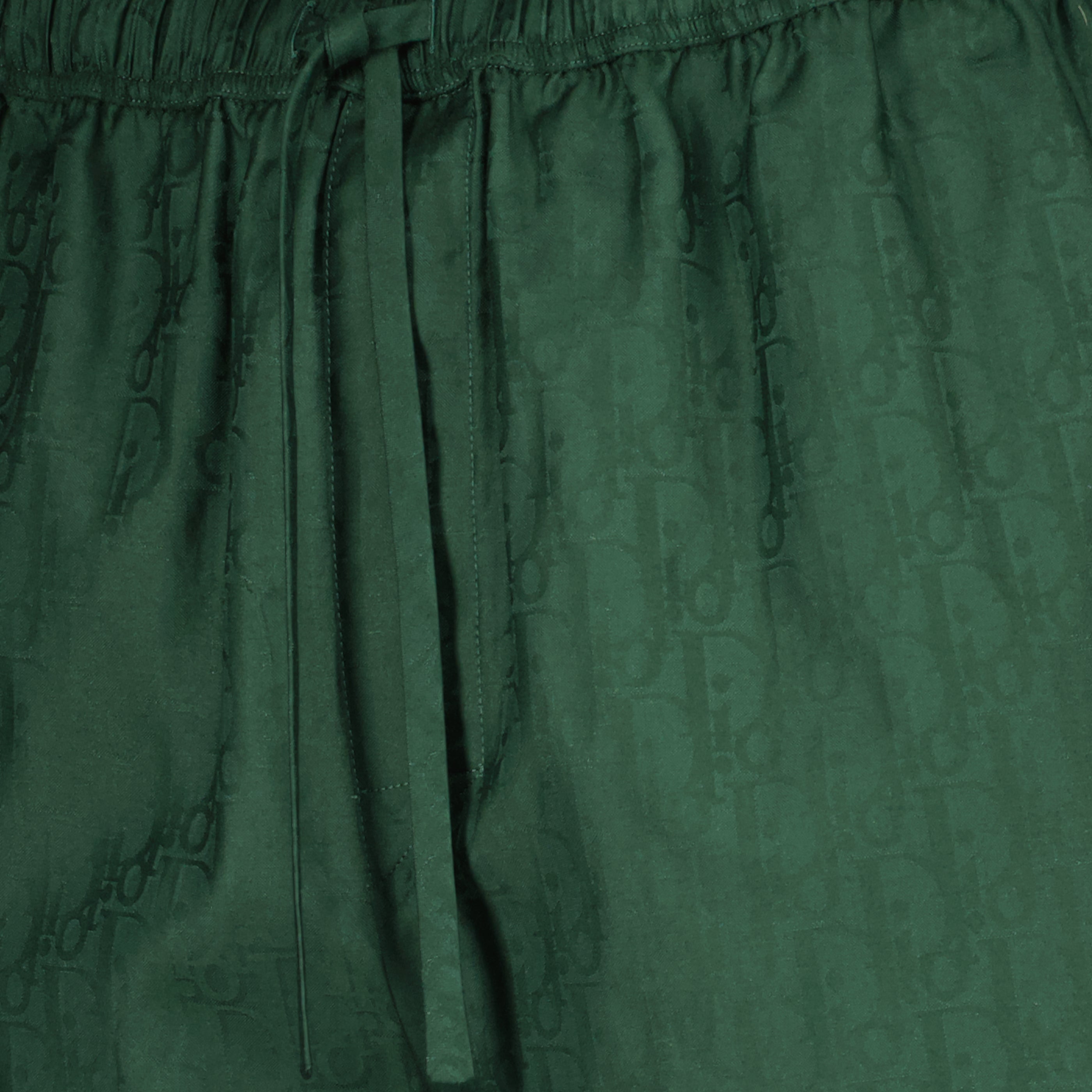 Image of the Dior Oblique green silk shorts for Men - Spring-Summer 2026 - Detailed View_1