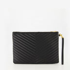 Imagem da clutch Cassandre preta da marca Saint Laurent para Mulheres - Temporada Primavera-Verão 2026 - Vista Traseira