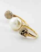 Bijoux Bague double Skull Alexander McQueen Doré Femme